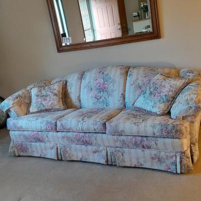 Beautiful Broyhill floral sofa with throw pillows and arm protectors