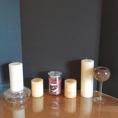 New, unburned Candles and candle sconces