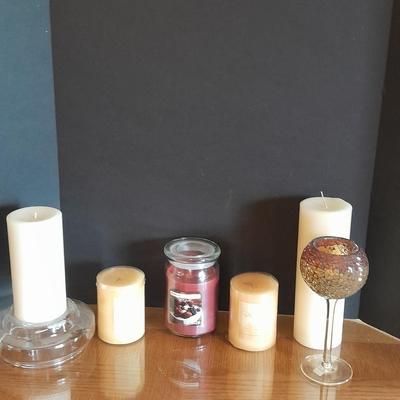 New, unburned Candles and candle sconces