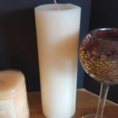New, unburned Candles and candle sconces