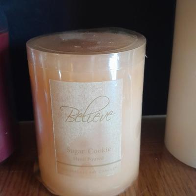 New, unburned Candles and candle sconces