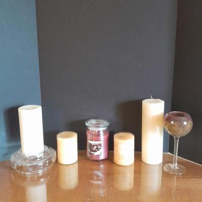 New, unburned Candles and candle sconces
