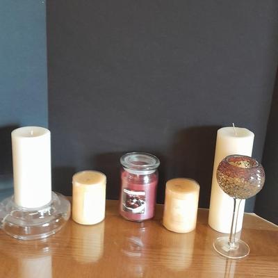 New, unburned Candles and candle sconces