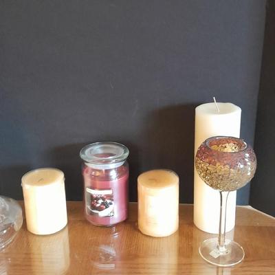 New, unburned Candles and candle sconces