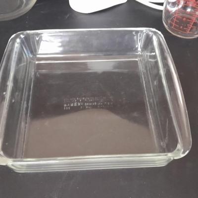 Hamilton Beach hand mixer with Mixing bowl, brownie pan, and glass pie dishes