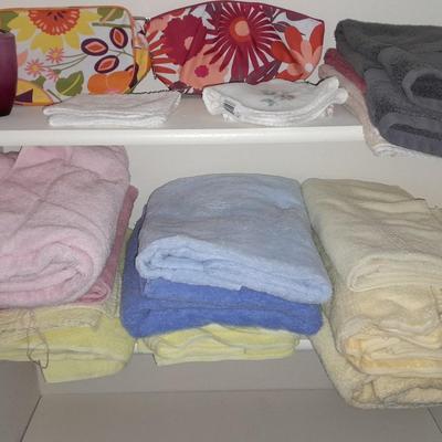 Mismatch bath towels, hand towels and washcloths, and two cosmetic bags