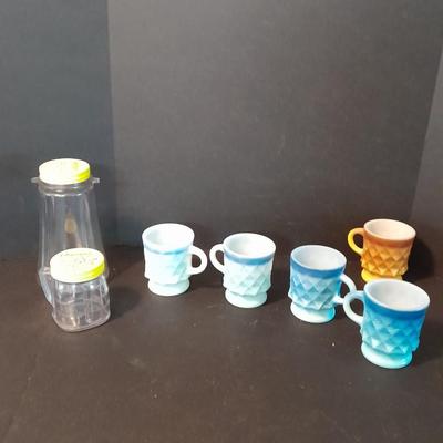 Vintage Fireking mugs and Osterizer mini blend containers blend and store.