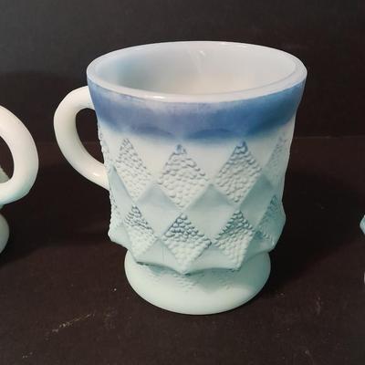 Vintage Fireking mugs and Osterizer mini blend containers blend and store.