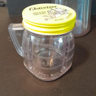 Vintage Fireking mugs and Osterizer mini blend containers blend and store.