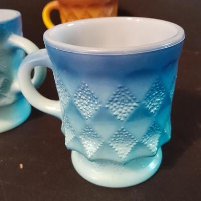 Vintage Fireking mugs and Osterizer mini blend containers blend and store.