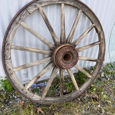 LOT 1579 Antique Wagon Wheel Wooden Glass-top Table