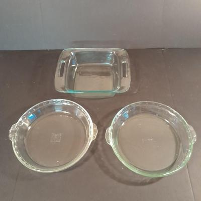 Two glass pie dishes and a Brownie glass pyrex dish