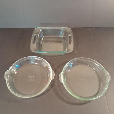 Two glass pie dishes and a Brownie glass pyrex dish