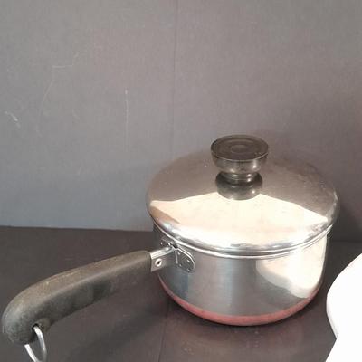 Revereware 1 Qt. saucepan with lid, Kitchen Utensils, and a Tools canister.