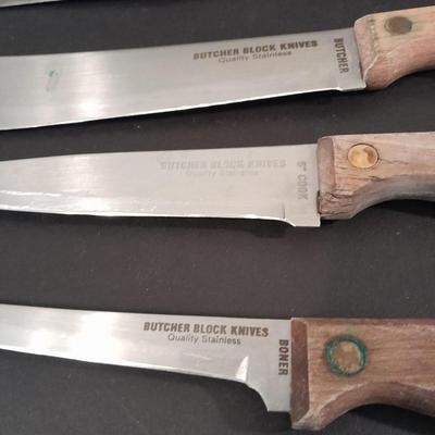 Wooden handled knife set with carving fork