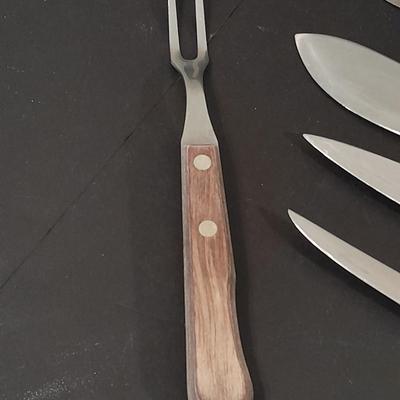 Wooden handled knife set with carving fork