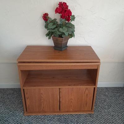 Sauder Furniture Swivel top TV / Storage cabinet with fake Geranium flower