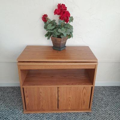 Sauder Furniture Swivel top TV / Storage cabinet with fake Geranium flower