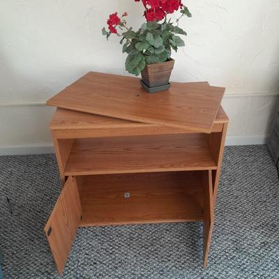 Sauder Furniture Swivel top TV / Storage cabinet with fake Geranium flower