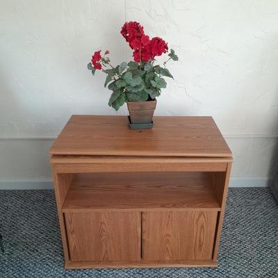 Sauder Furniture Swivel top TV / Storage cabinet with fake Geranium flower