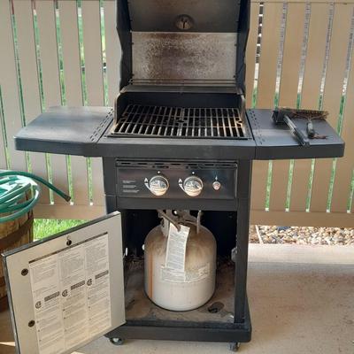 Master Forge Barbeque Grill with cleaning tools and propane tank