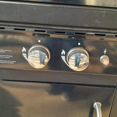 Master Forge Barbeque Grill with cleaning tools and propane tank