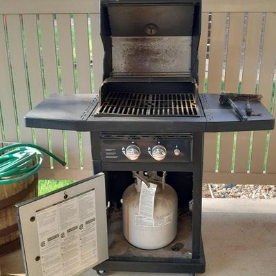 Master Forge Barbeque Grill with cleaning tools and propane tank