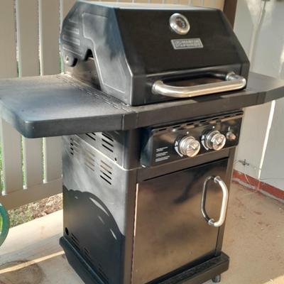 Master Forge Barbeque Grill with cleaning tools and propane tank