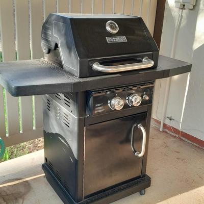 Master Forge Barbeque Grill with cleaning tools and propane tank