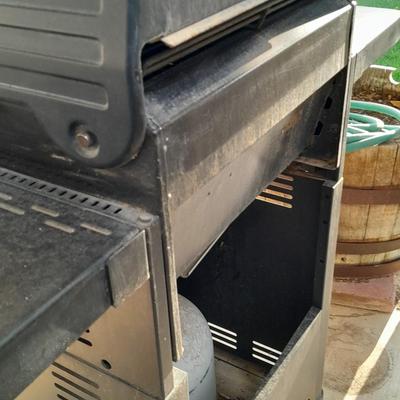 Master Forge Barbeque Grill with cleaning tools and propane tank