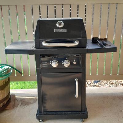 Master Forge Barbeque Grill with cleaning tools and propane tank