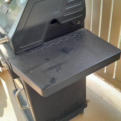 Master Forge Barbeque Grill with cleaning tools and propane tank