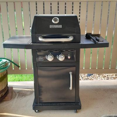 Master Forge Barbeque Grill with cleaning tools and propane tank