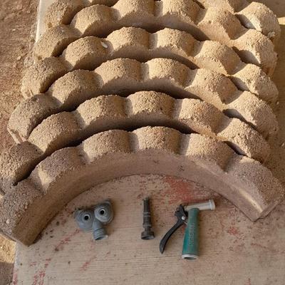 Six Scalloped tree ring landscape bricks and three hose attachments