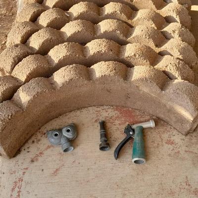 Six Scalloped tree ring landscape bricks and three hose attachments