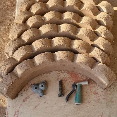 Six Scalloped tree ring landscape bricks and three hose attachments