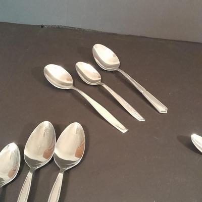 Assortment of different brands of Spoons Flatware