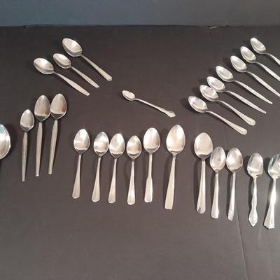 Assortment of different brands of Spoons Flatware