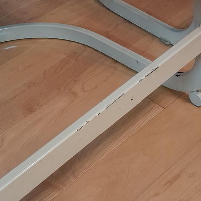 Two metal framed blue cushioned bar stools
