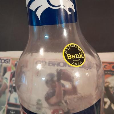 Bronco's Collectibles, bottle bank, Sweatshirt, T-shirt Coffee mug and paper clippings