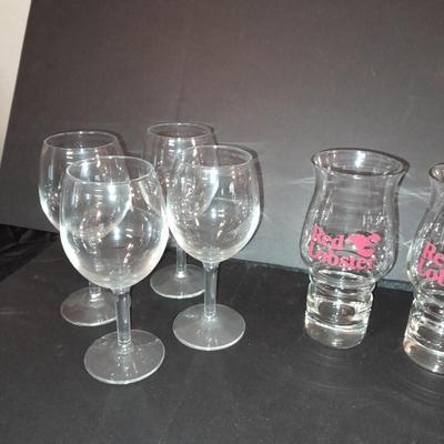 Two red Lobster glasses and stemware wine glasses