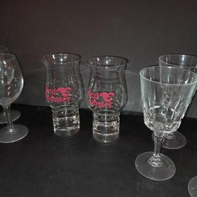 Two red Lobster glasses and stemware wine glasses