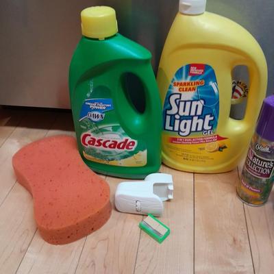 Dishwasher soap and other cleaning supplies full to almost full bottles