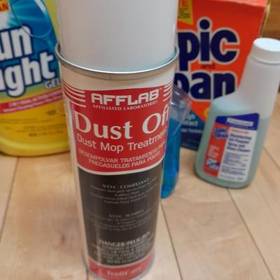 Dishwasher soap and other cleaning supplies full to almost full bottles