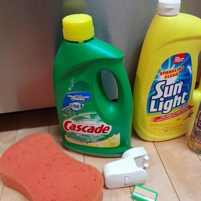 Dishwasher soap and other cleaning supplies full to almost full bottles