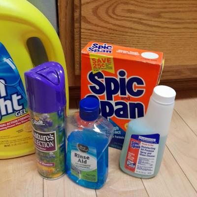 Dishwasher soap and other cleaning supplies full to almost full bottles
