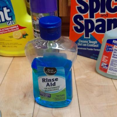 Dishwasher soap and other cleaning supplies full to almost full bottles
