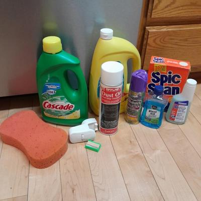Dishwasher soap and other cleaning supplies full to almost full bottles