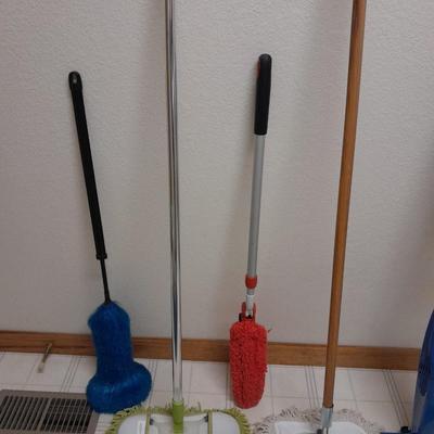 Cleaning tools, dusters, mops, and a Eureka Boss Vacuum broom
