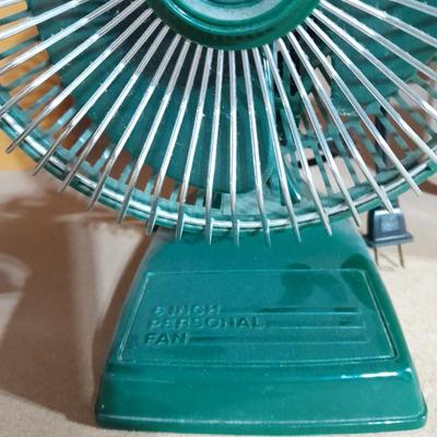 Small tabletop green colored fan and Sunbeam Ultrasonic Humidifier